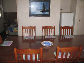 Lodge Burrabogie Dining Table at Waterfront Retreat at Wattle Point, Gippsland Lakes Accommodation
